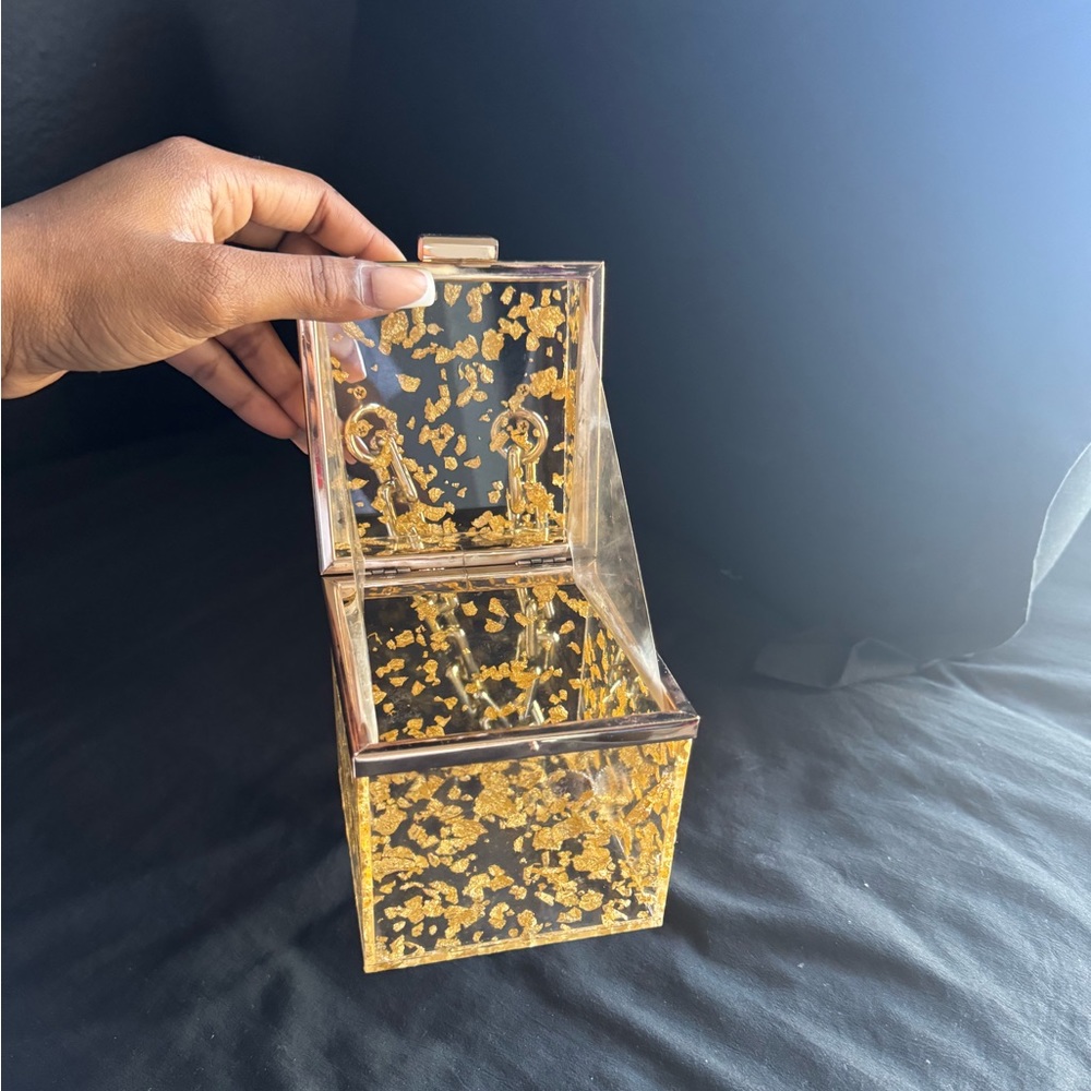 Fashionova golden clutch purse